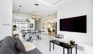 modern white interior with gold furnishings and decor
